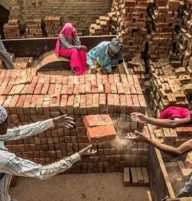 Why do brick factories use brick palletizers instead of manual palletizing?
